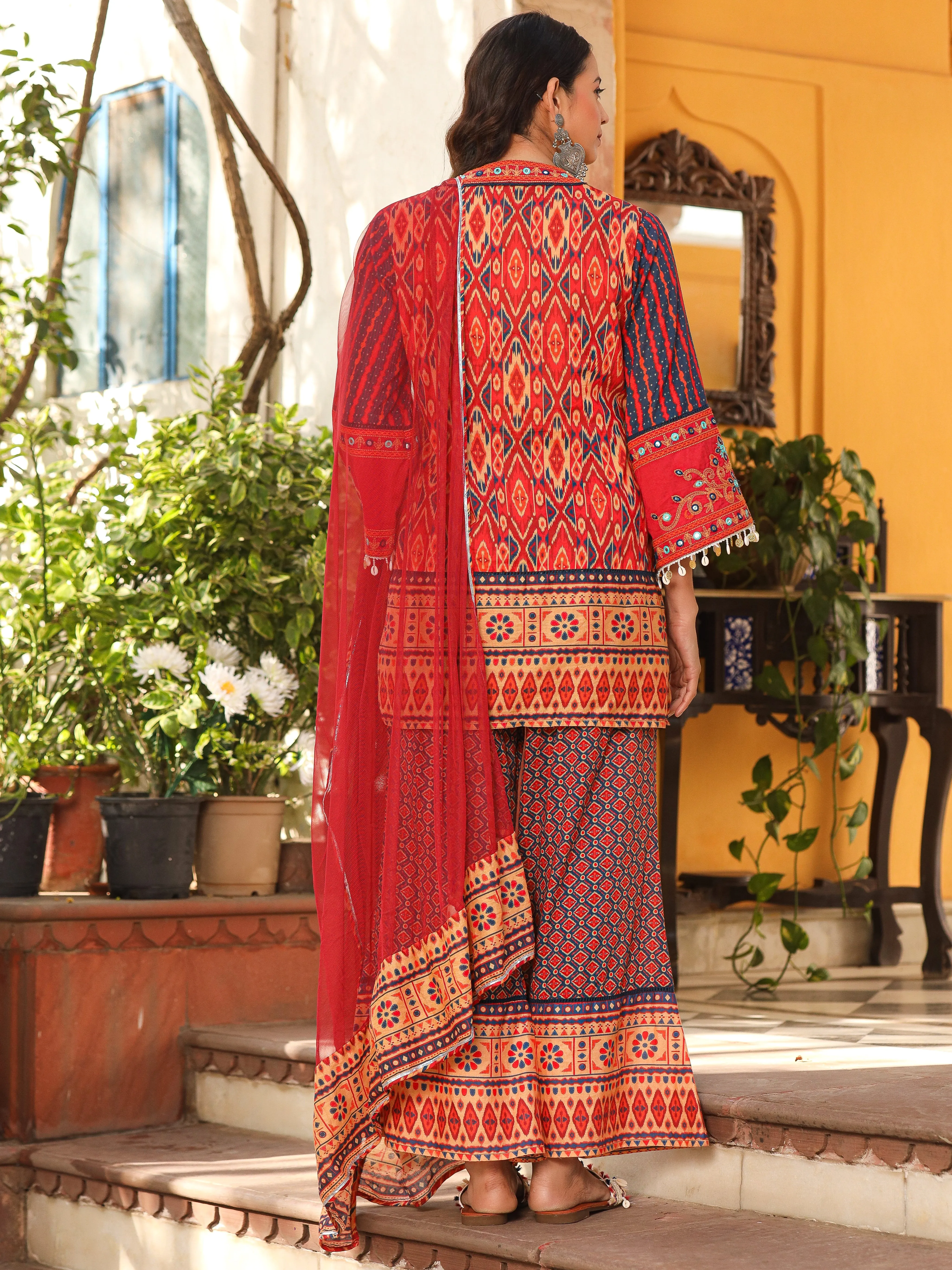 Jashvi Rust Ikat Printed Cotton Voile Kurta Bell Bottom & Dupatta Set  With Coins Kaudis & Mirror Work